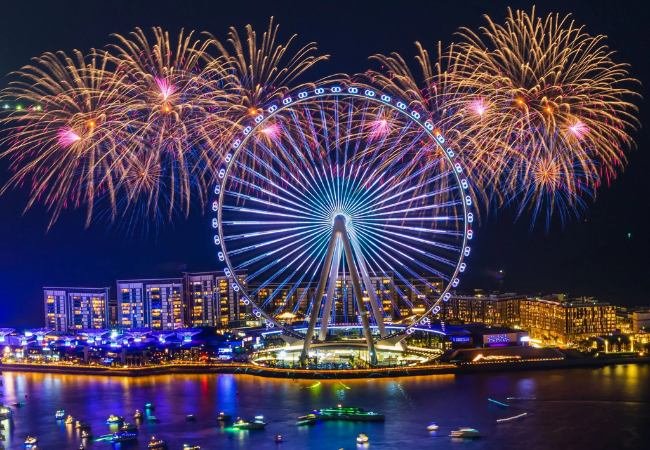 Ain Dubai, the world's largest observation wheel, lit by fireworks over Bluewaters Island — from Mayra Tours' own gallery